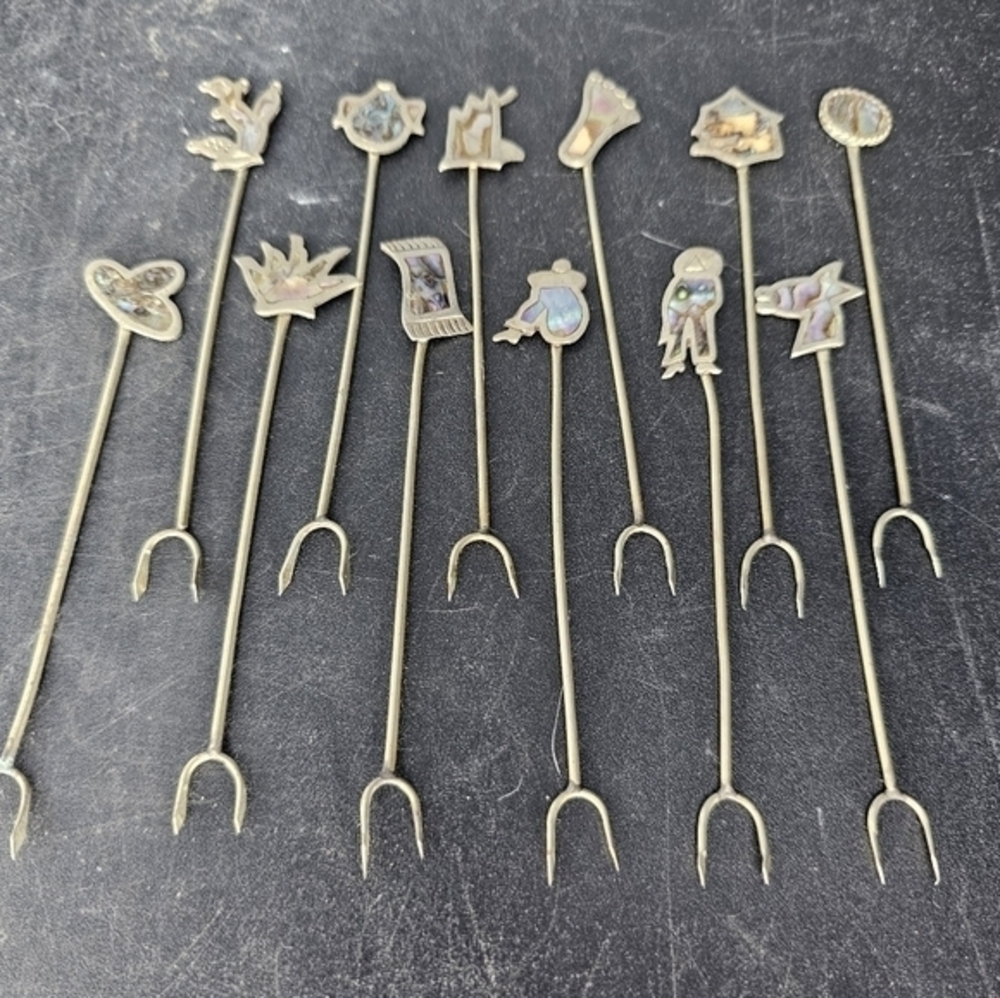 Vintage Silver, (Not S.S.)Taxco Mexico cocktail picks with a southwestern theme‎